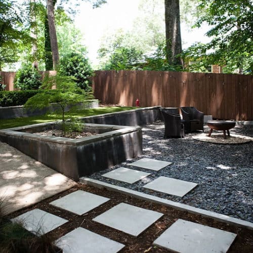 Modern terraced patio landscape with concrete, stucco, crushed slate