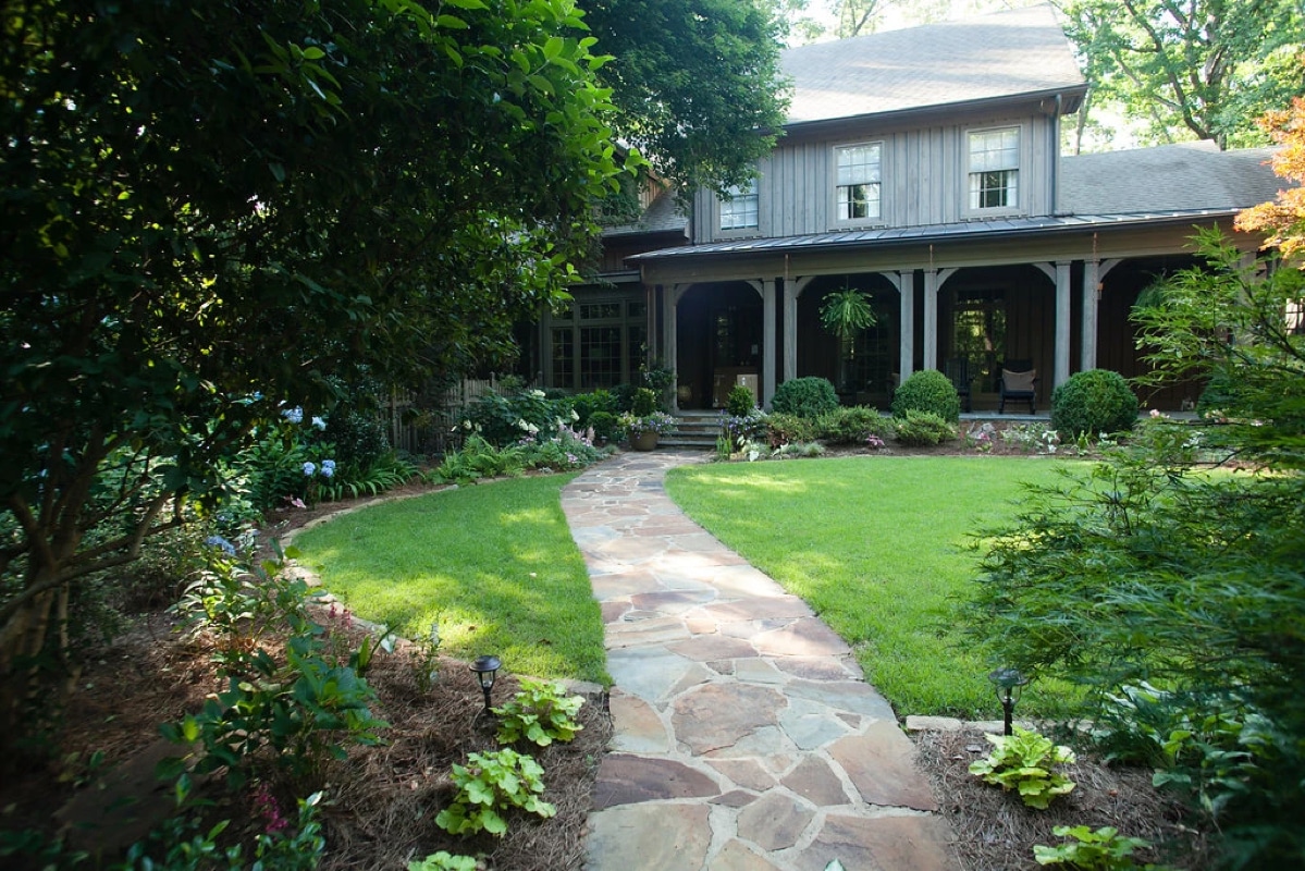 English country garden with stone pathway