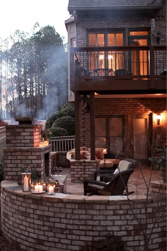 Brick and stone patio with fireplace for fall outdoor relaxing