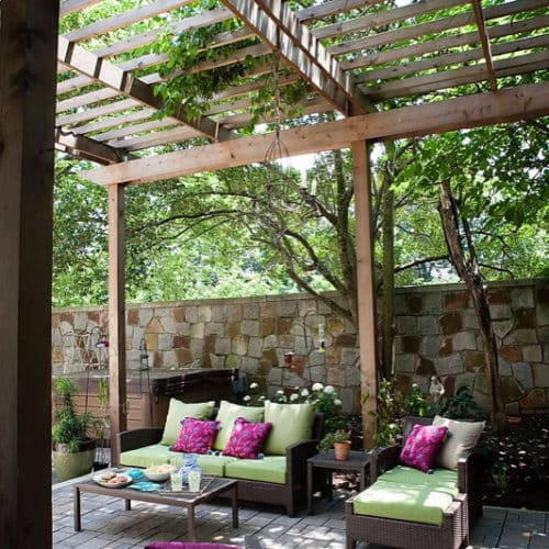 City backyard paver patio with pergola