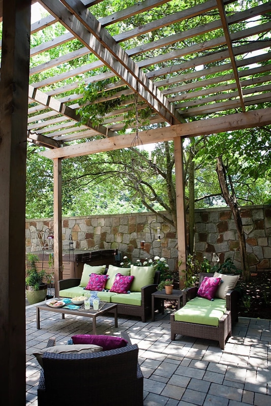 City backyard paver patio with pergola