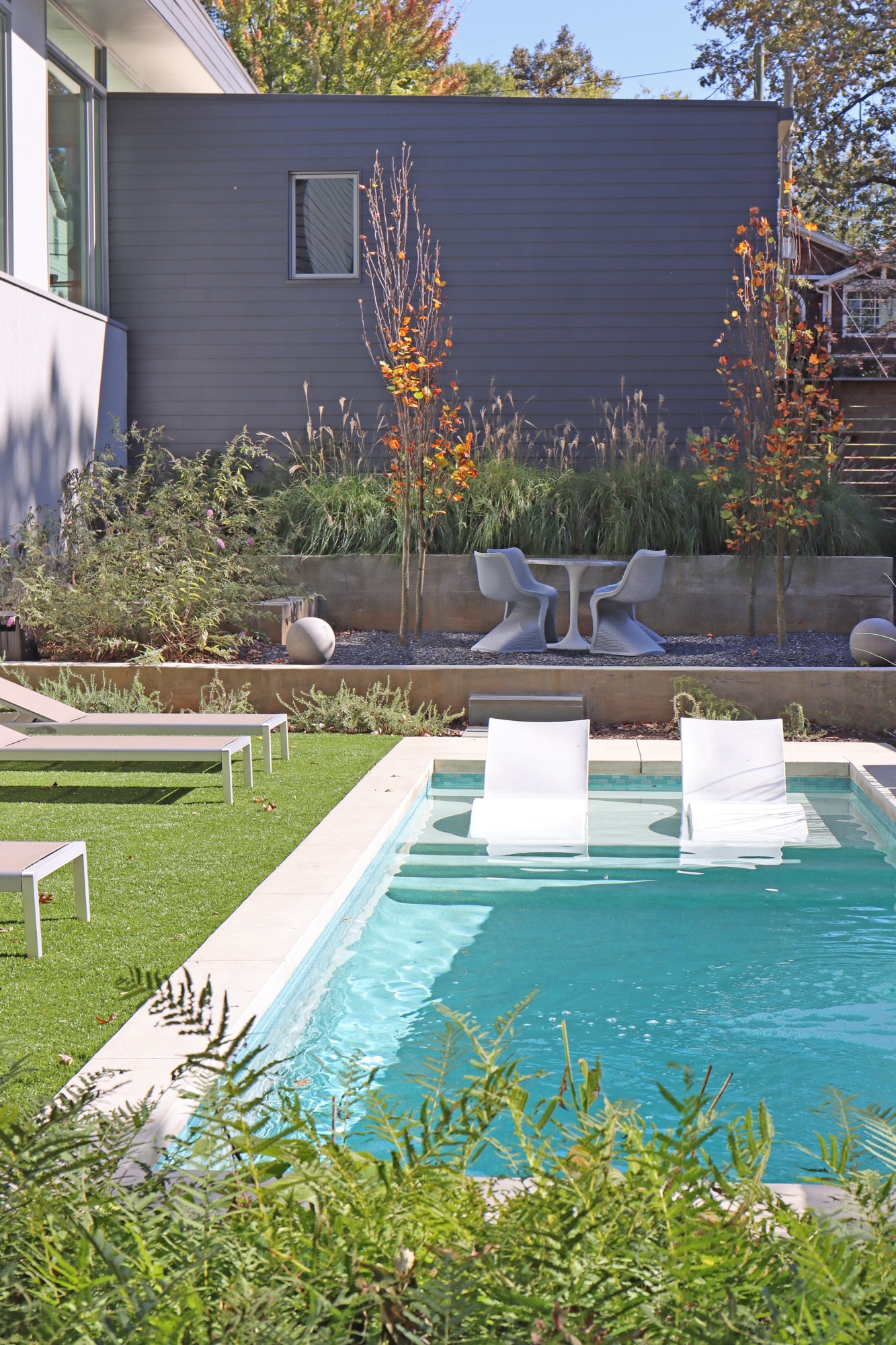 Terraced backyard with swim spa
