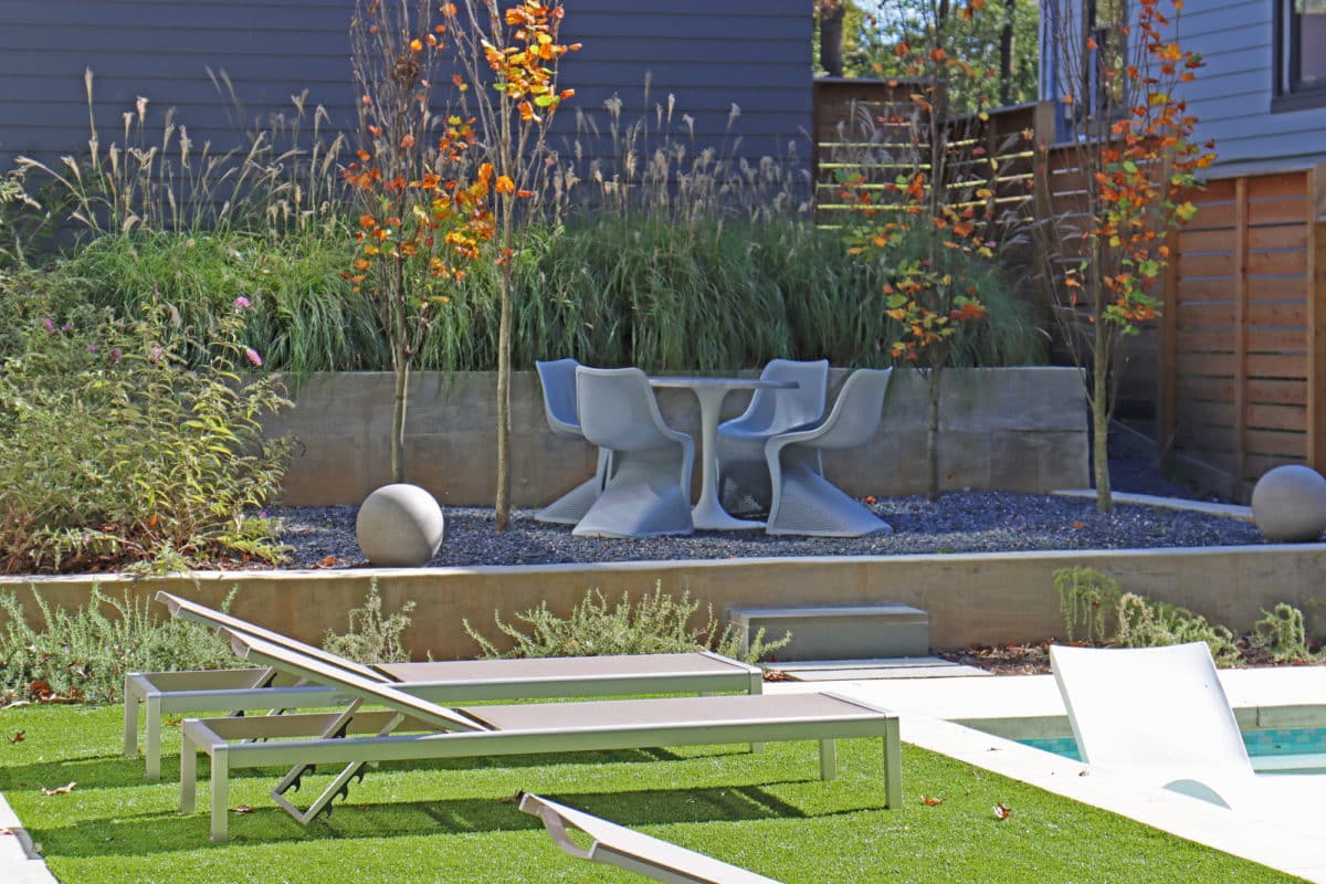 Terraced backyard with patio and loungers
