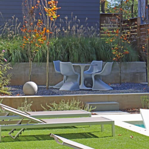 Terraced backyard with patio and loungers