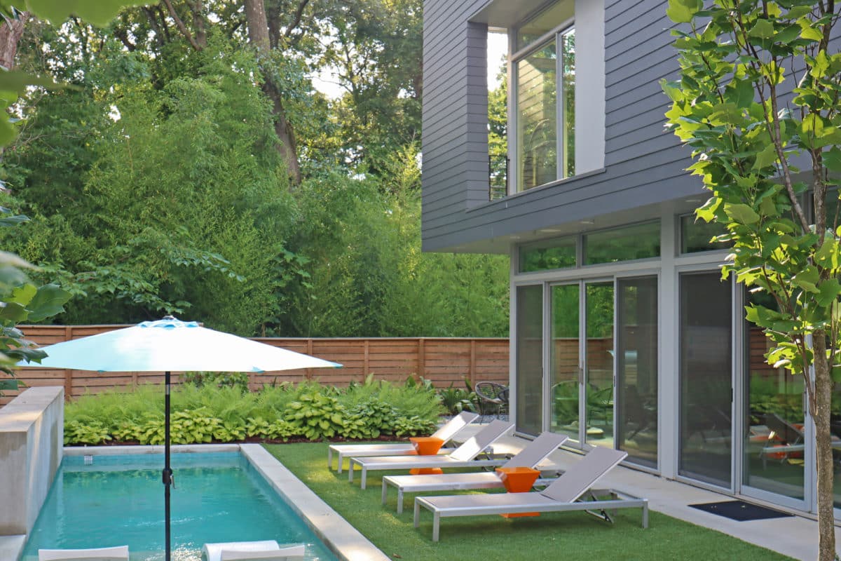 Modern backyard landscape with pool