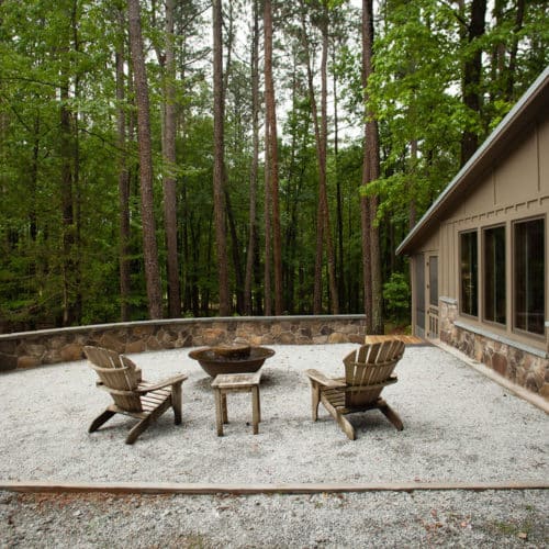 Flagstone seat wall with gravel patio and fire pit
