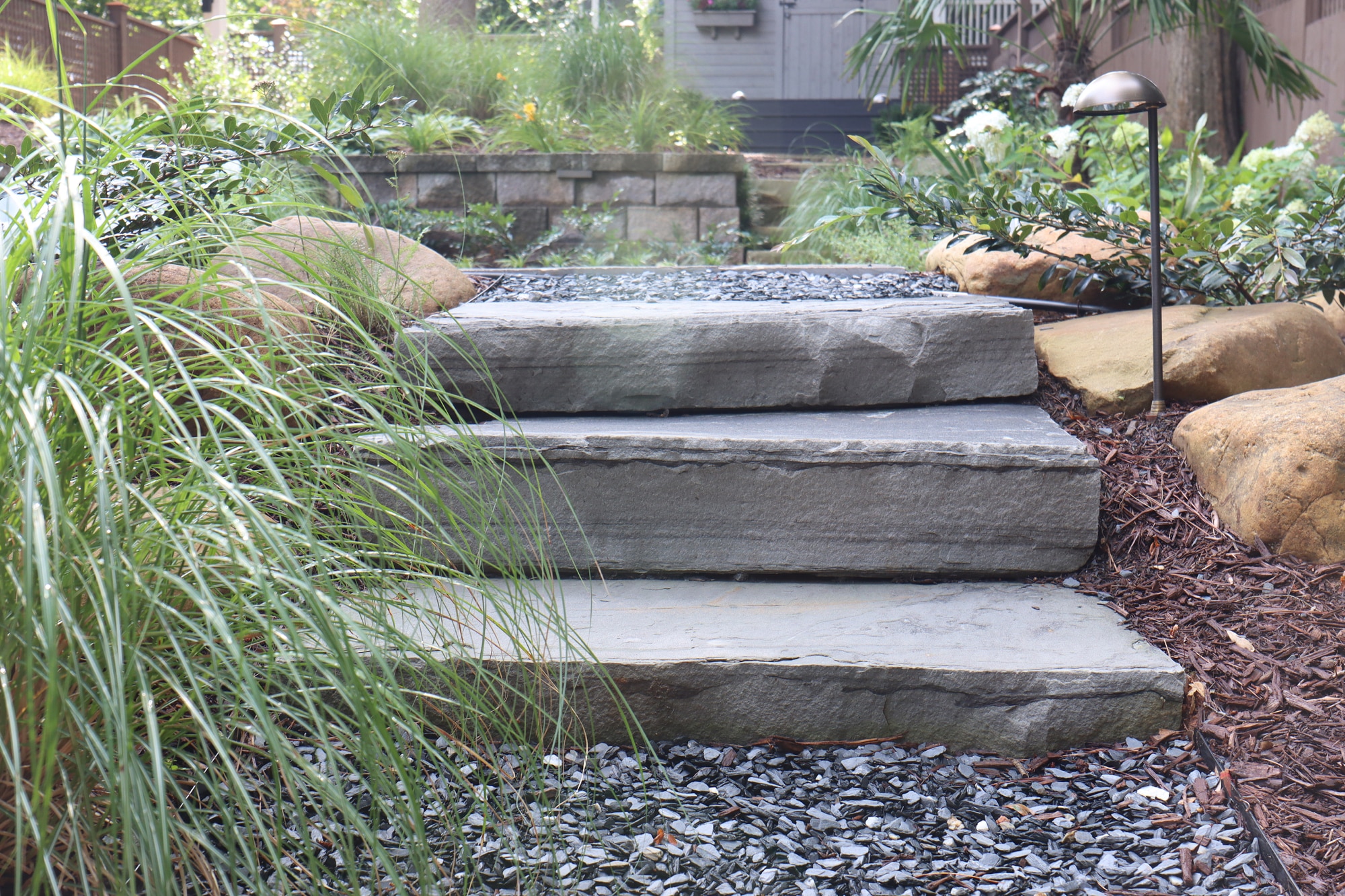 Flagstone slab steps with slate path and landscape light