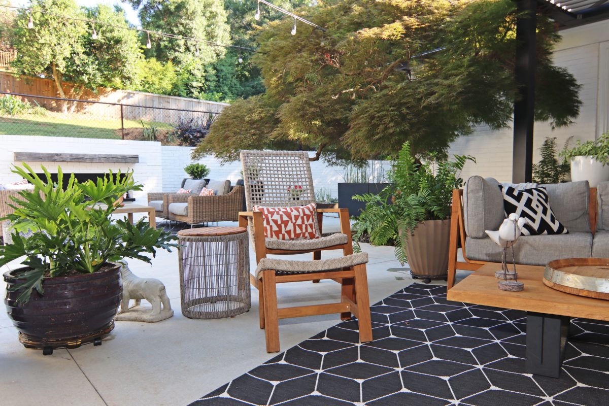 Modern backyard patio with furniture