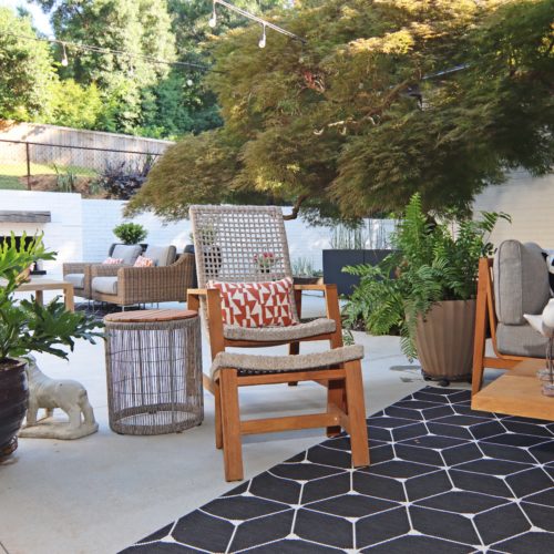 Modern backyard patio with furniture