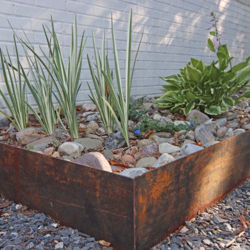 Corten steel raised bed for backyard plantings