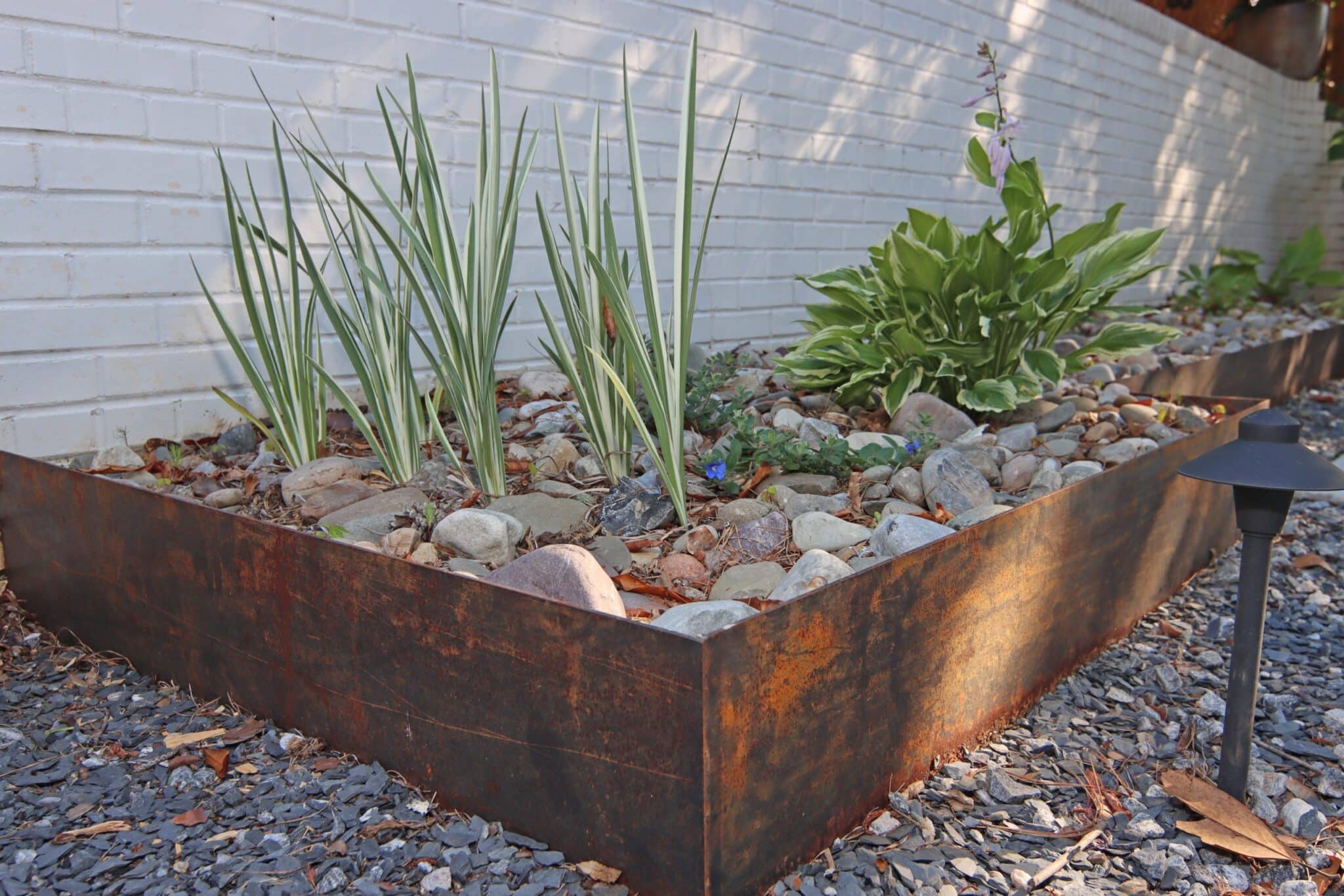 Corten steel raised bed for backyard plantings