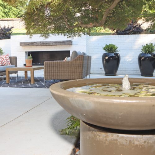 Water feature in modern patio area