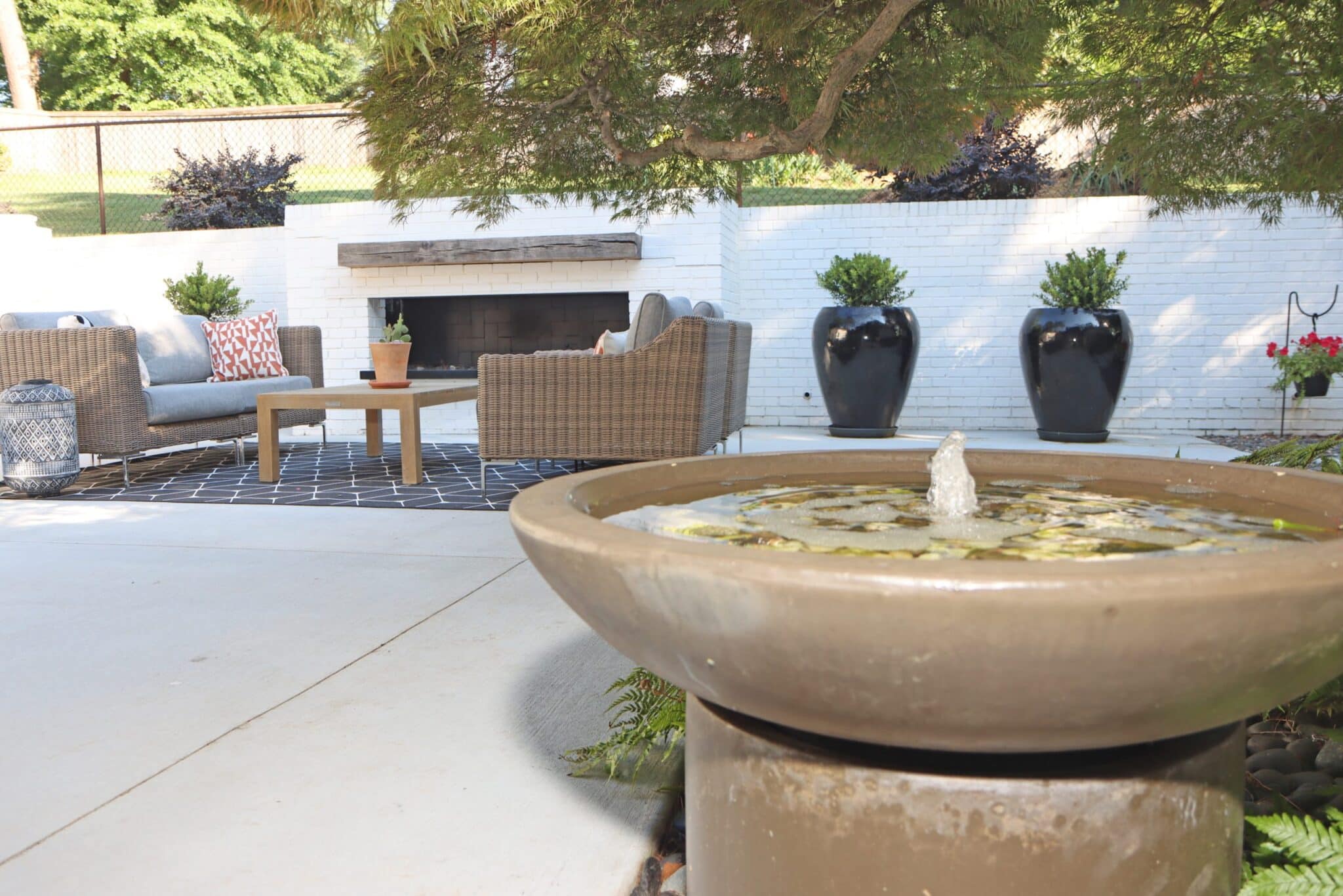 Water feature in modern patio area