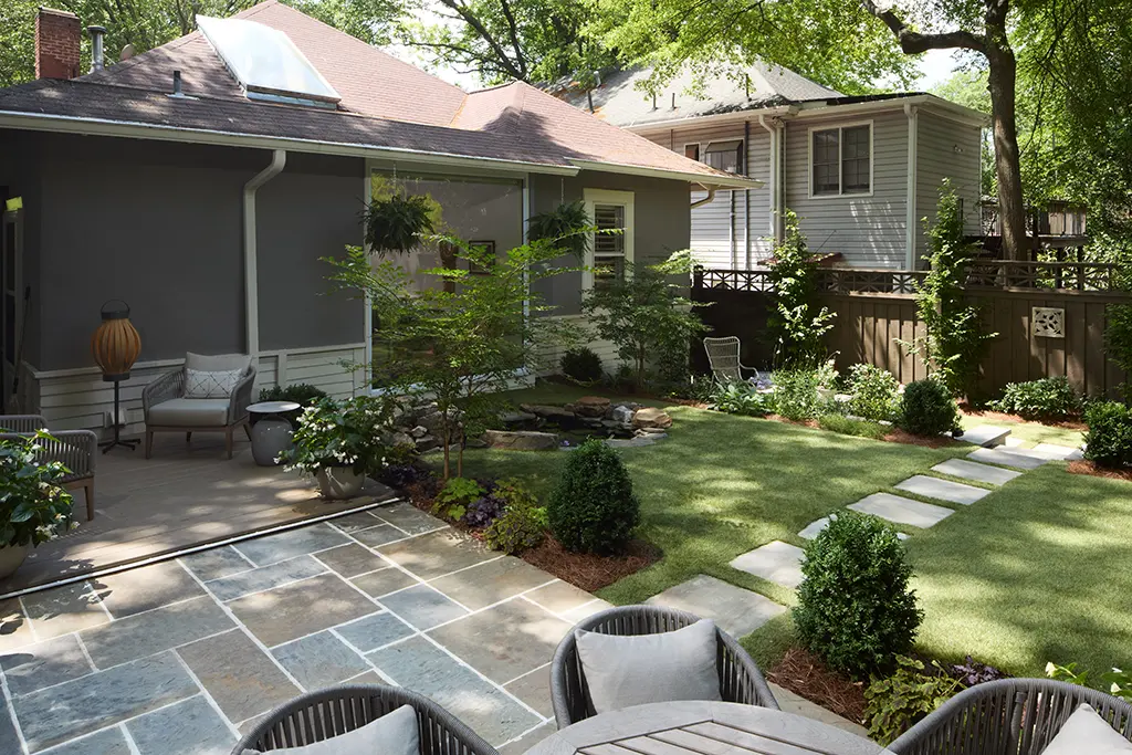 Modern landscape design in Atlanta with custom patio and concrete steps